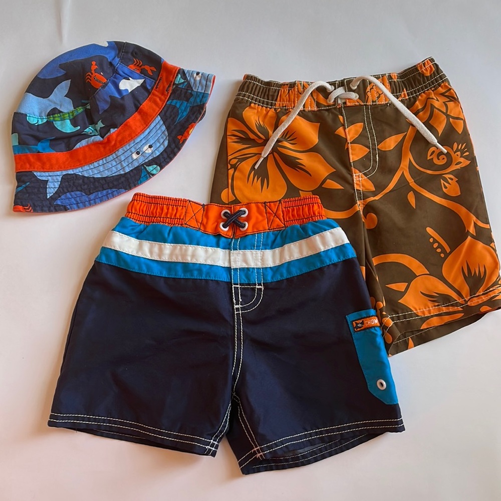 Two boys swim trunks and one beach hat, 12 - 24 months